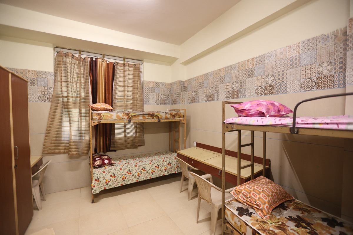 Hostel room at AECS Maaruti College of Nursing